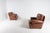 Beautiful classic design set of 2 lounge chairs in brown leather produced by Italian manufacturer, loose cushions. Good...