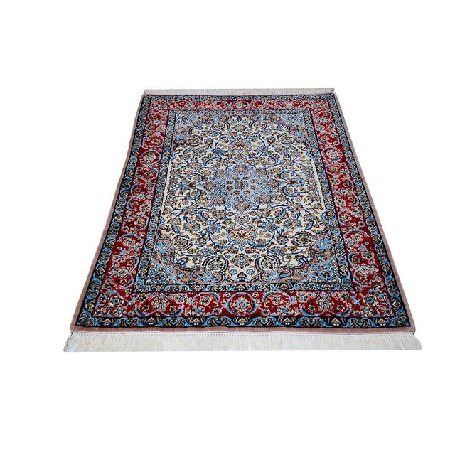 This isfahan rugs is made of cork wool and silk on silk tied and is in a perfect and unused state. Very fine and dense...