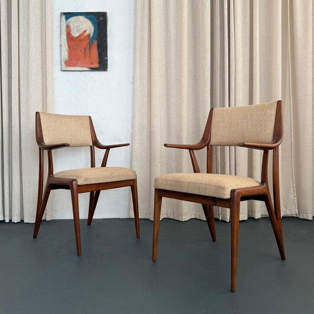 This pair of Mid-Century Modern armchairs are by the maker M. Singer & Sons circa late 1950s. They are attributed to...