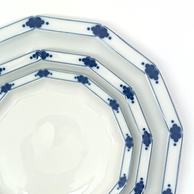 White and blue rim plates, group of 6. This set of Corinth dinner plates was designed by Tapio Wirkkala for Rosenthal...
