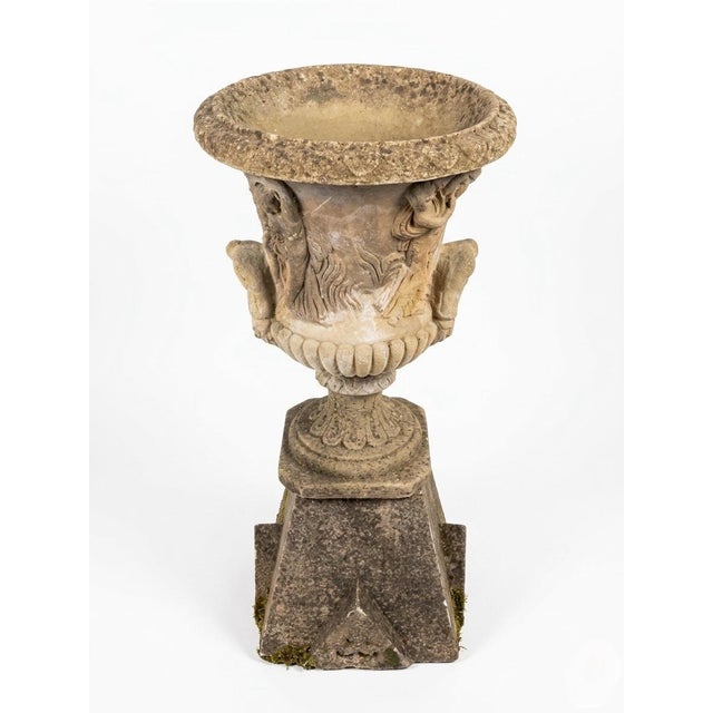 This impressive Neo-Classical style garden urn features a classic campana-form design with high-relief mythological...