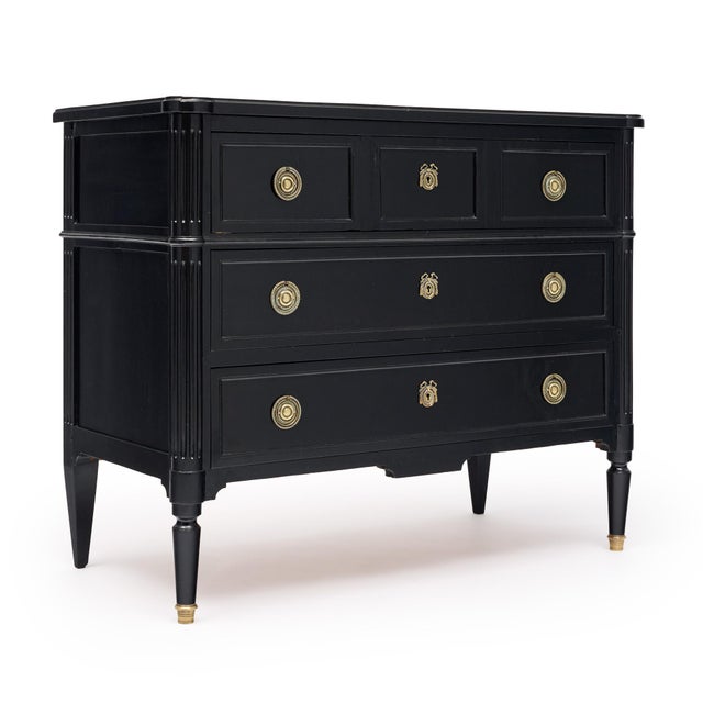 Chest of drawers from France in the Louis XVI style. This piece is made of solid wood construction, primarily mahogany....