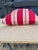 A pillow newly crafted pillow made from a circa 1900 red and white cotton stripe ticking, a down insert is included