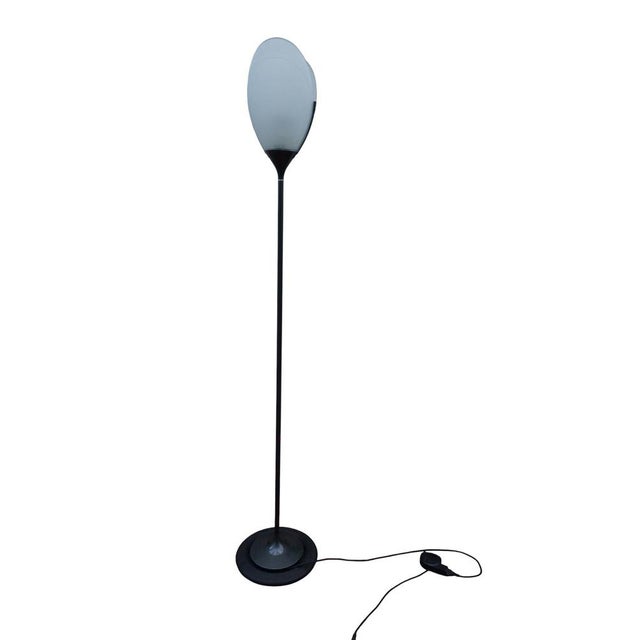 The Arteluce Corolle floor lamp, an iconic design object of Italian postmodernism, was designed in 1991 by the renowned...