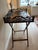Elegant vintage mahogany butlers tray table featuring a removable rectangular tray with decorative pierced lattice gallery...