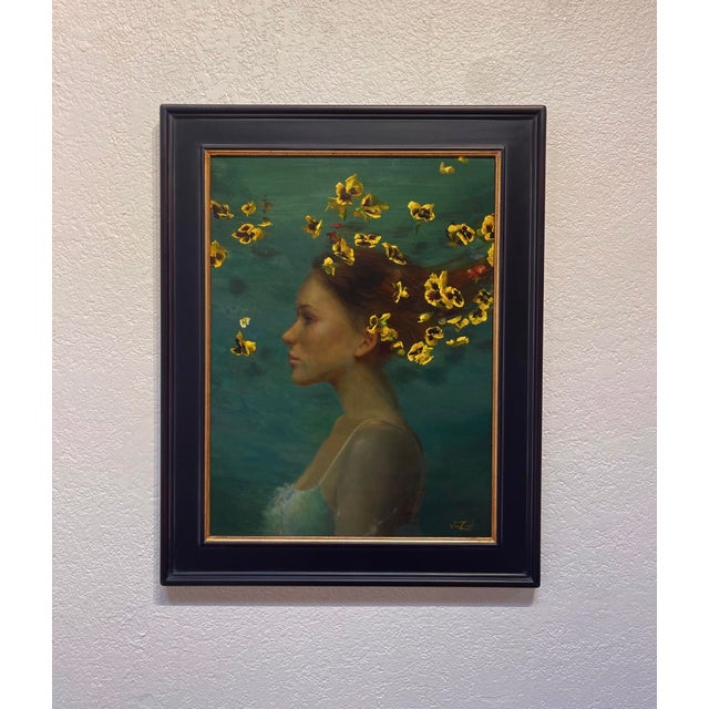 In "Yellow Breeze," a young woman's profile is elegantly juxtaposed against a lush, green background, where vibrant yellow...