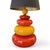 A table lamp in true 80s style, crafted from red, orange, and mustard yellow ceramic. Made by the French firm Albret, this...