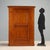 Mid 19th-century Italian larch wardrobe, featuring a sober and functional design typical of the era. The front door is...