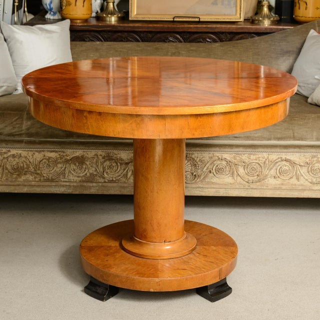 This is a nice example of an Antique Biedermeier Cherrywood Round Center Table, C.1940s. This table e had originally one...