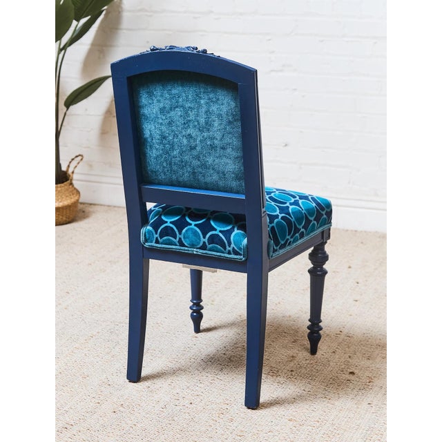 With its modern profile, natural wood legs, and stylish frame, this dining chair is sure to be an eye-catching piece for...