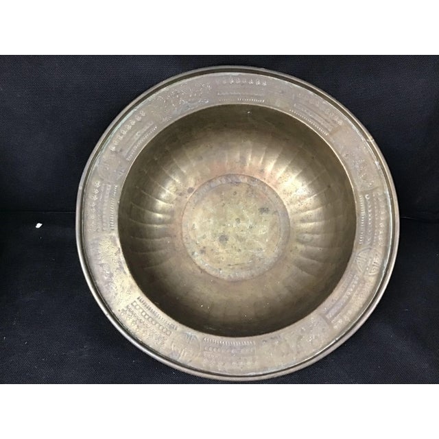 Antique Chinese Bowl, at least 100 years old. Handmade of hammered brass with etched designs throughout and ready to be...