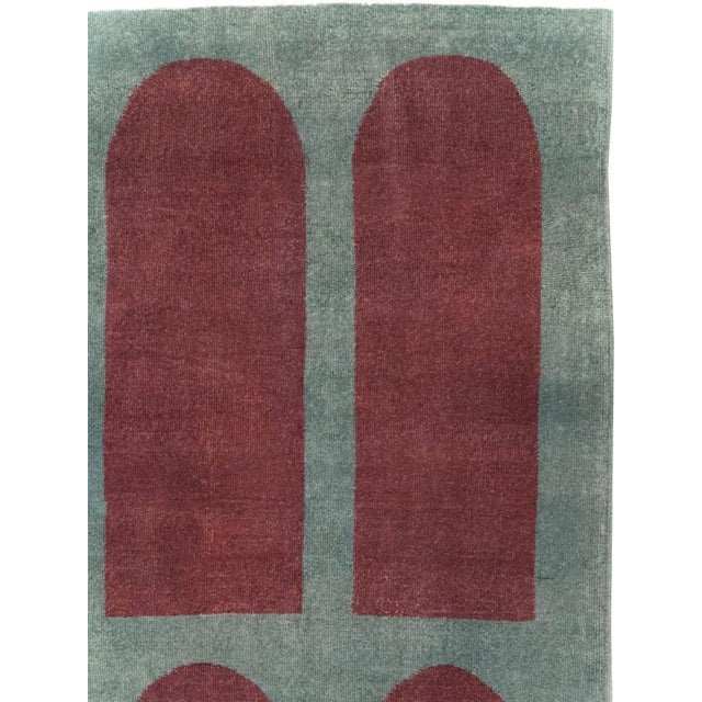 This Mid-20th century Turkish Art Deco Style room-size carpet presents a bold, highly ordered composition of fifteen...