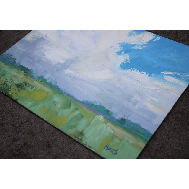 Contemporary Landscape Oil – Dramatic Sky Over Soft Green Meadow This original oil painting presents an expansive sky...