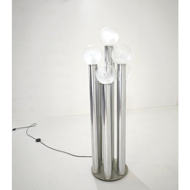 Original Space Age floor lamp (often referred to as the "organ pipe lamp"), attributed to the renowned Italian designer...