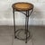 A tall bar stool or peninsula stool attributed to 20th-century craftsmanship, characterized by a refined eclectic style...