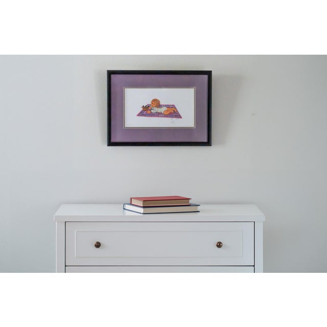 A beautifully preserved piece from the renowned "Monthly Babies" series by P. Buckley Moss. This specific work, "August’s...