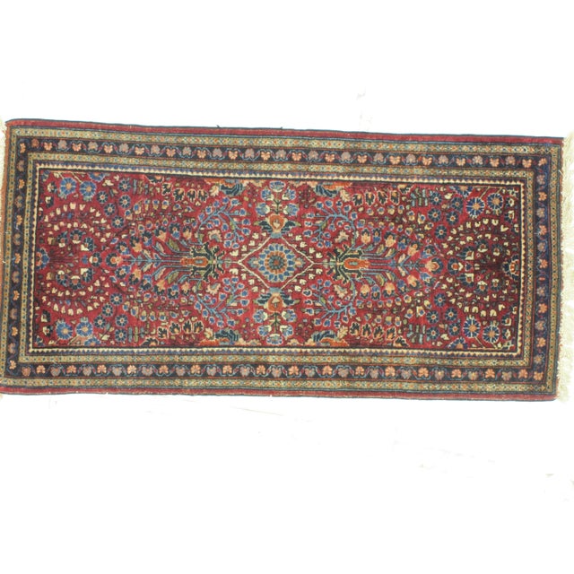 Wool pile hand made very fine antique Persian Sarouk rug in excellent condition. Burgundy back ground. It's a versatile...