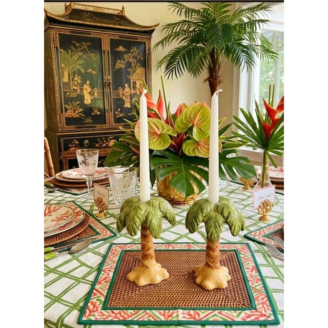 ​Bring the effortless sophistication of retro coastal living indoors with this charming pair of vintage ceramic palm tree...