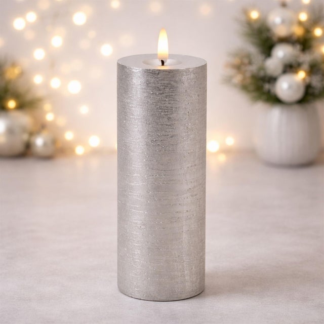 Create a warm and inviting glow in your home with this Metallic FIA Wick LED Candle set. Designed with a realistic wax...