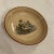 A Fine and scarce circa 1810 English drabware child’s saucer. Transfer printed on front depicting a mother bathing an...