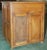 Nicely made teak cabinet with hinged top and two doors. We have a nearly identical second piece for a matched pair.