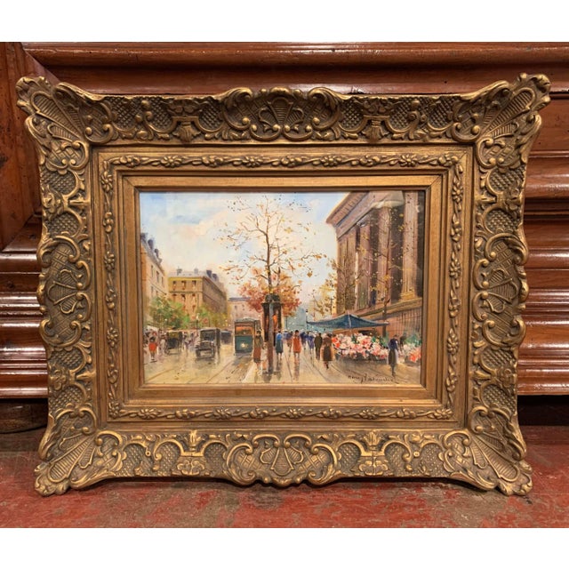 Capture the atmosphere of Belle Époque Paris with this charming pair of antique street scenes. Crafted in France circa...