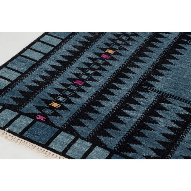 Hand-knotted in wool, this 8x10 contemporary rug joins Rug & Kilim’s Scandinavian collection. It features a teal-blue...