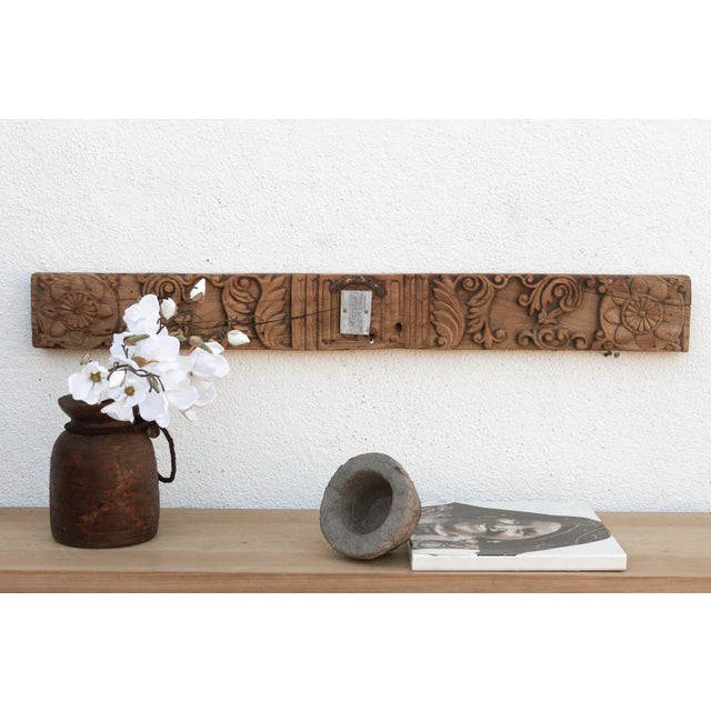 Uncover a piece of history with this authentic architectural carving, salvaged from the structures of 19th-century India....