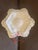 This vintage oyster plate by Two's Company features a distinctive six-well floral-themed design with a central circular...