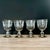 A beautiful vintage set of 4 Goblets from the Queen Esther pattern by Libbey, Homer Laughlin, featuring the signature...