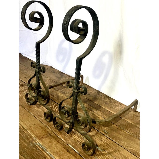 This monumental-scaled 1920s fireplace andirons are very much in the style of Addison Mizner and were acquired from a...