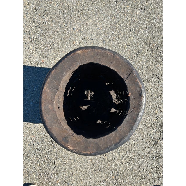 Handcarved table from Cameroon. Carved out of solid wood. Stained with natural dyes. Could be used on its or in a company...