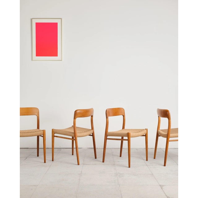 Dimensions: approx. 50 × 47 × 75 × 44 cm (width × depth × height × seat height) Original set of four dining chairs by...