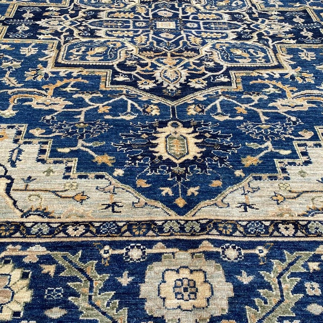 Fine Persian Tabriz design hand-knotted rug featuring a magnificent stepped central medallion in ivory and navy,...