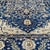 Fine Persian Tabriz design hand-knotted rug featuring a magnificent stepped central medallion in ivory and navy,...
