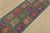 A modern traditional Bakhtiari runner hand-knotted with fine wool on a cotton foundation. This rug features rows of...