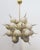 Italian sputnik chandelier with 24 Murano glass globes and solid brass spikes mounted on brass frame in unlacquered...