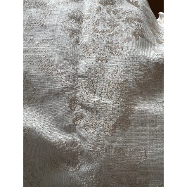 Lovely natural linen with a beige embroidered damask pattern from Cowtan and Tout.Measures 17” long by 56” wide Perfect...