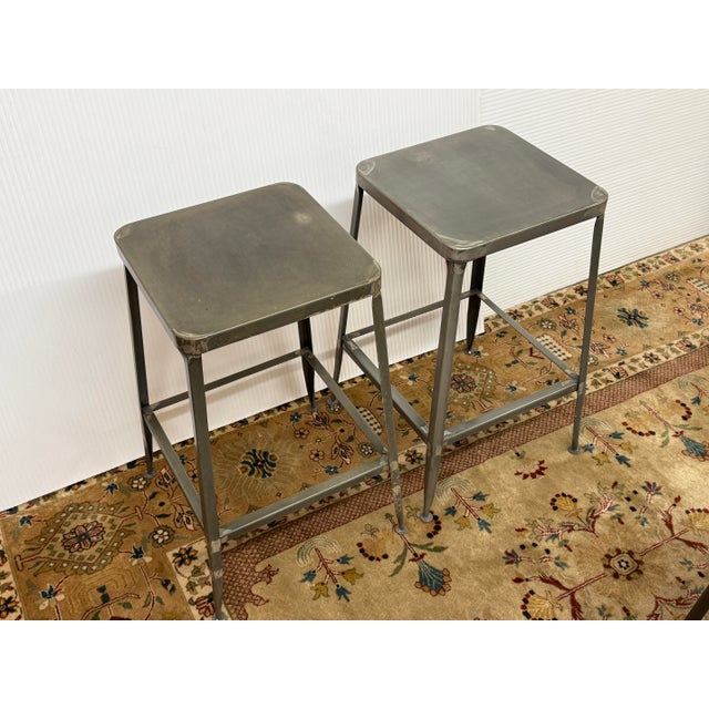 Design Plus Gallery presents a Pair of Flint Counter Stools from CB2. These stools are the epitome of industrial glam. The...