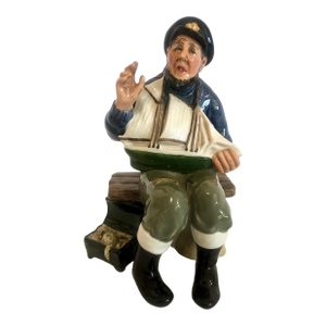 Royal Doulton’s Sailor Figurine Telling His “Tall Story”
