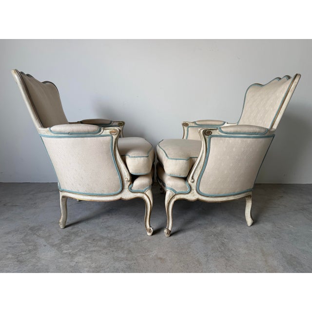 Pair of Vintage Hollywood Regency French Louis XV-Style Painted & Gilt Bergère Lounge Armchairs For Sale In Miami - Image 6 of 12