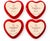 Charming set of four Émile Henry heart-shaped ceramic baking dishes, handcrafted in France. Each dish features a glossy...