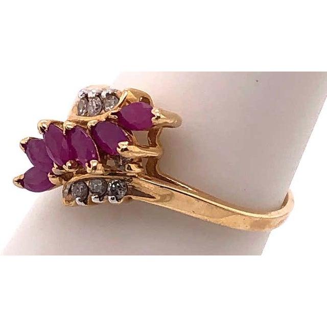 14 Karat Yellow Gold Contemporary Ruby Ring With Diamond Accents For Sale In New York - Image 6 of 6