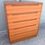 Classic Danish Modern teak tallboy dresser designed by Nils Jonsson for Tørring Møbelfabrik. The streamlined case features...