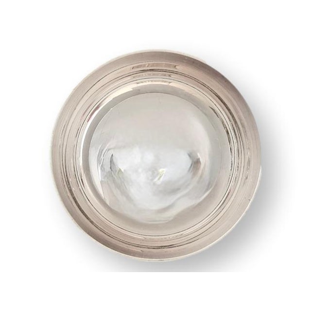 Set of 12 Mid 20th century English hotelware silverplated ice cream dishes with classic coupe form and understated...