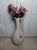 Large off-white textured ceramic floor vase or amphora with a single side handle Style: Rustic Color: off-white...
