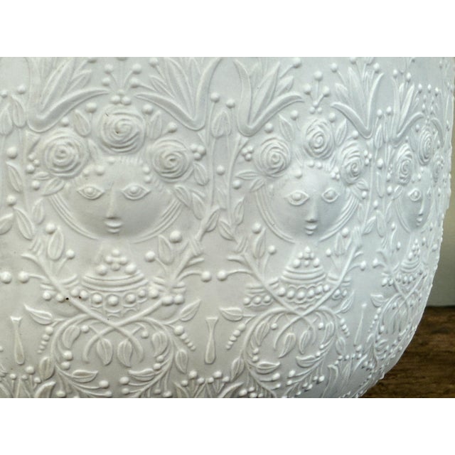 Mid century porcelain bowl designed by Bjørn Wiinblad for Rosenthal Studio-Linie, featuring the Romanze pattern with crisp...