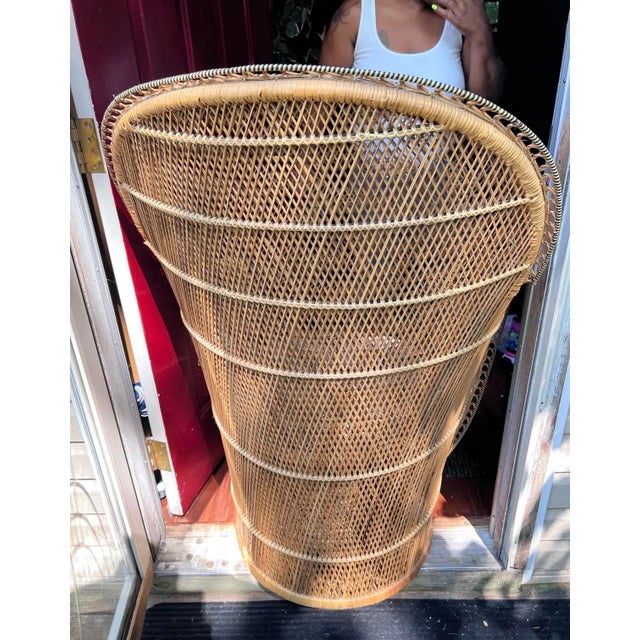 Up for consideration is a beautiful vintage petite boho wicker peacock chair and cushion. This would look lovely in your...