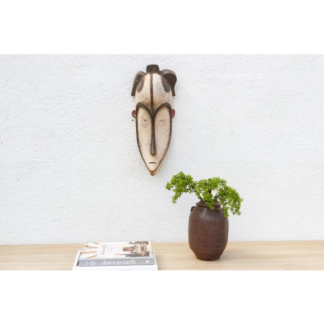 This haunting Fang Ngil mask from Gabon is a powerful and evocative piece of African tribal art. The mask is characterized...