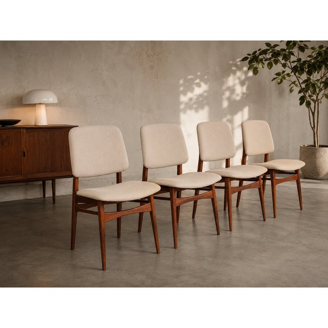 Beautiful set of 4 original “Milaan” dining chairs designed by Louis van Teeffelen in the 1960s. These chairs feature the...